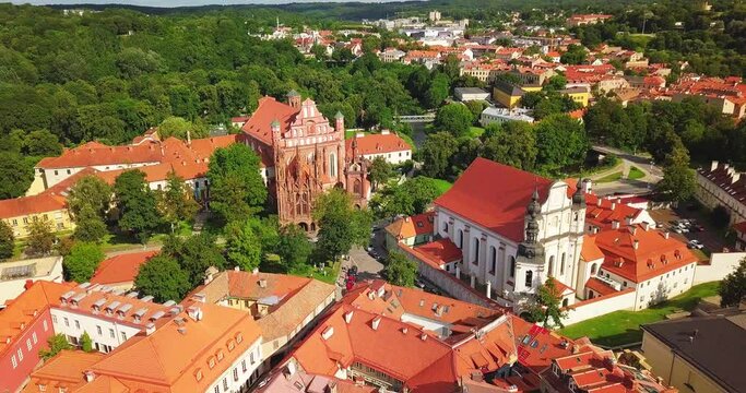 Vilnius, Lithuania. Roman Catholic Church Of St. Anne And Church Of St. Francis And St. Bernard In Old Town In Summer Sunny Day. UNESCO World Heritage