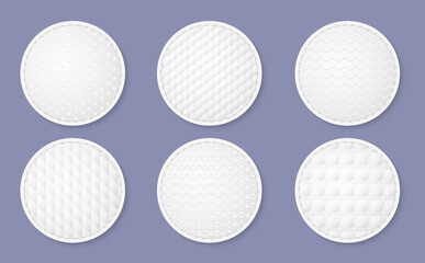 Cosmetic cotton pads texture. Realistic round white discs, hygiene and skin care product, soft face sponge with different embossing patterns, makeup remover accessory, utter vector set © YummyBuum