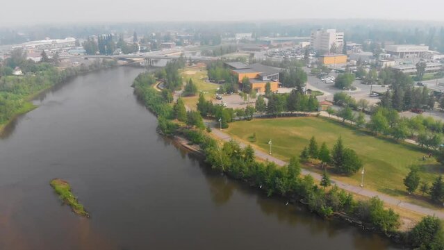 4K Drone Video of Morris Thompson Cultural Center on the Chena River in Downtown Fairbanks, Alaska on Summer Day