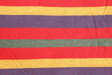 Multicolored fabric texture. Colorful striped background with different colors.