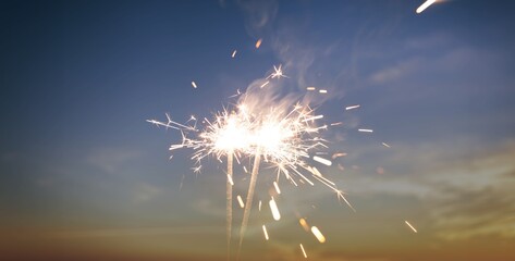 Holding a bright sparkler for independence day