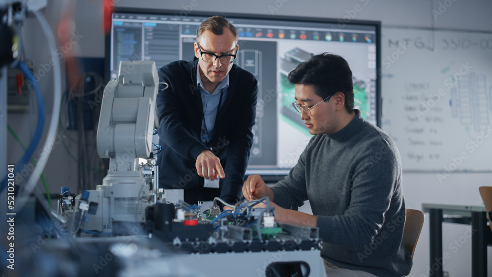 Aufkleber Chief Engineer Helping Asian Student of Engineering Faculty Work With Computer Motherboard and Processor. People Discussing with Each Other. Science, Robotics and Engineering Concept.