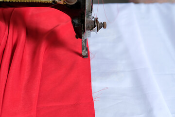 The tailor makes the Indonesian national flag ahead of independence day