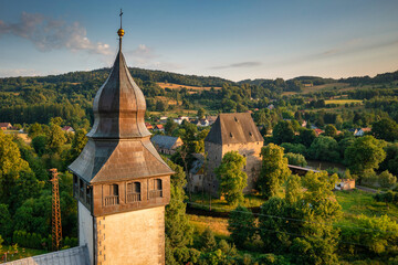 The gothic Siedlecin Ducal Tower illuminated by the setting sun in the Bobr Valley Landscape Park, Lower Silesia. Poland © Patryk Kosmider