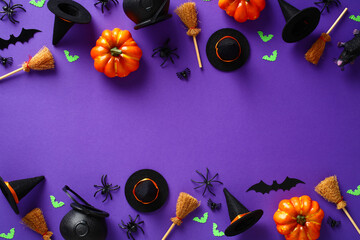 Happy Halloween holiday concept. Frame made of Halloween decorations, pumpkins, bats, spiders,...