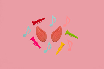 ears around which are colorful trumpets and notes, creative art design, listening to music, pink...