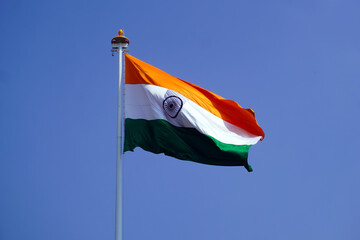 Beautiful Indian flag flying in the sky - Powered by Adobe