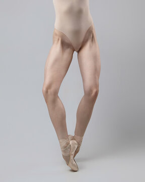 ballerina's legs in close-up. photo shoot in the studio on a white background