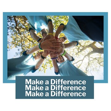 Low Angle View Of Multiracial Volunteers Stacking Hands In Park With Make A Difference Day Text