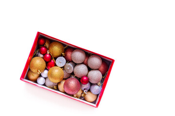 Christmas toys in a box. isolated on white background with copy space for text.
