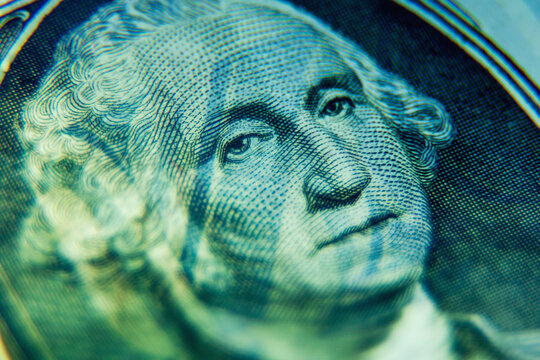 Close up image of George Washington on one Dollar bill. Horizontal image.