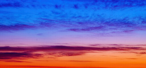 Evening sky. Abstract background. Blue and orange colors