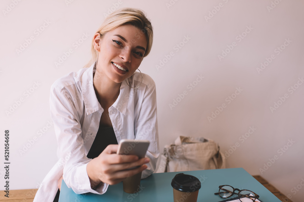 Aufkleber portrait of happy caucaisan blogger with digital smartphone technology smiling at camera during free