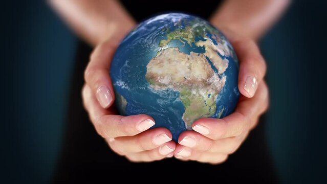 Female Hands Holding a 3D Spinning Earth.&nbsp;Ecology, Sustainable Lifestyle Concept. World Earth Day.