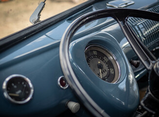 Fototapeta premium Dashboard and steering wheel of old-timer car
