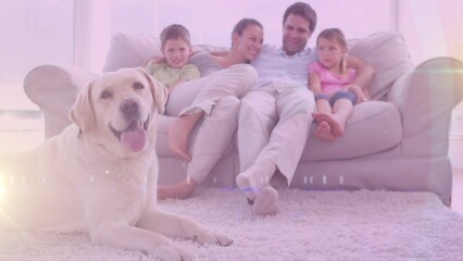 Spot of light against caucasian family and their dog at home