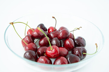 Fresh summer dark red sweet cherry isolated