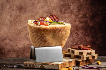 Kebab, pita, gyros, shaurma, wrap sandwich stuffed with sausages from minced meat with grilled...
