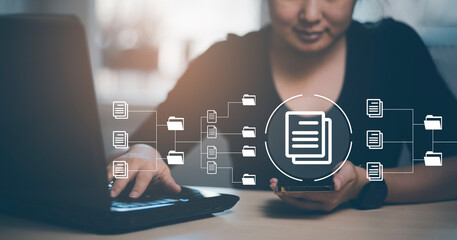 Hand using laptop and touch folder of document Management System, online documentation database and process automation to efficiently manage files work, knowledge, Corporate business technology,