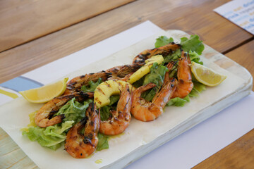 Grilled pineapple snd shrimp salad with citrus dressing - delicious salad full of nutrients and minerals that can be served on the side or as a main dish.