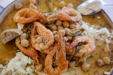 Prawns with chick peas and garlic in white cod roe.