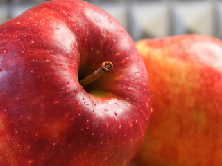 Delicious red apples photographed in close-up. Ripe fruit. Juicy Red Apple