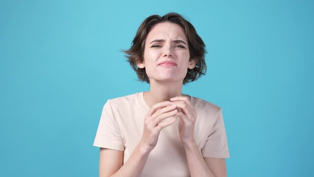 Lady not seeing anything isolated on blue color background