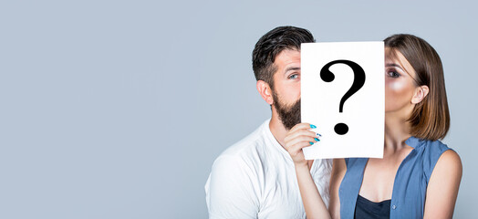 Couple holding paper question mark. Anonymous, man and woman question, incognita. Problems and solutions. Couple in quarrel