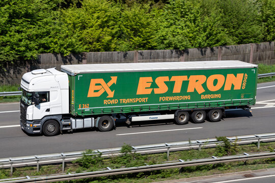 WIEHL, GERMANY - MAY 3, 2022: Scania truck with Estron curtainside trailer on motorway