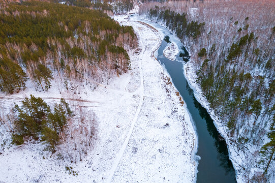 river and snow aerial view, winter landscape of unfrozen river