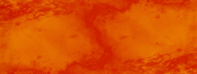 Abstract grainy messy warm grunge splashed orange background with seamless vintage grunge texture, beautiful and bright orange or yellow background for wallpaper and design.