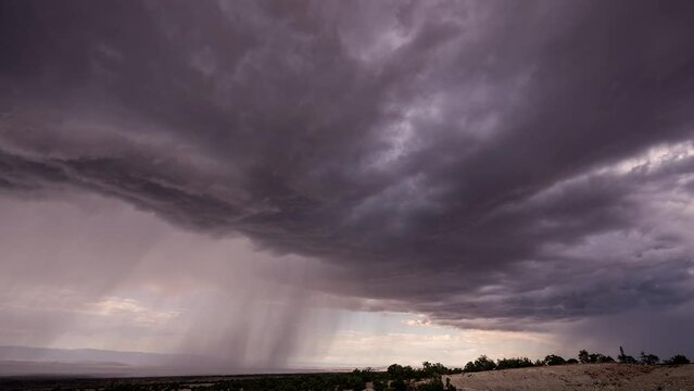 Timelapse of monsoon storm moving through the Utah desert as clouds rotate in the sky.