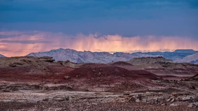 Sunset timelapse as storm moves over the desert mars like landscape in Utah near Hanksville.