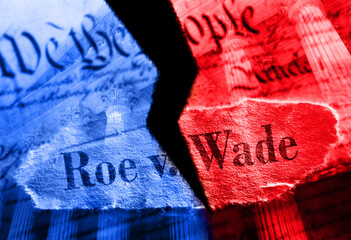 Torn red and blue Roe V Wade newspaper headline on the United States Constitution and Supreme Court - 521075655