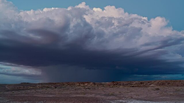 Timelapse of storm cell growing in the Utah desert as lightning flashes near Hanksville during summer monsoon.