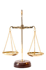 Gold balance scales with metallic chains and wood base used to compare weights, isolated on white background with clipping path cutout concept for legal judgment, justice metaphor and equality law - 521076014