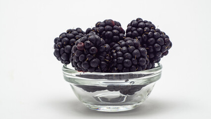 blackberries in a glass bowl close-up
