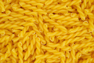 Italian pasta gemelli background. Top view. High quality photo