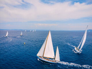 Argentario Sailing Week ketch yacht sailing and taking the mark - obrazy, fototapety, plakaty