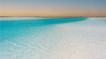 Perfect sandy beach with crystal clear waters and sand bars. Sea view from tropical beach. Travel concept.