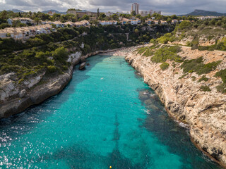 Aerial view over the Antena Beach "Cala Antena" in Cales de Mallorca in the Spanish Island of Mallorca in Spain.