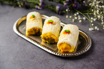 Malai Chop or Cream sandwich made using filling Rasgulla or Gulab jamun sweet is a Bengali sweet