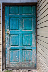 closed old wooden door with peeling paint (Corrected)