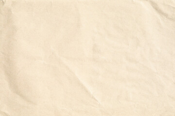 Beige crumpled paper background texture