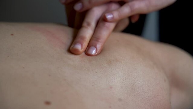 slow motion, close up of a person massaging