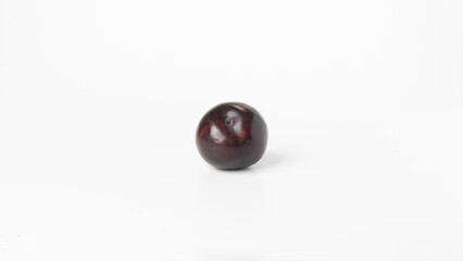 Plum cherry berries fruit on white background