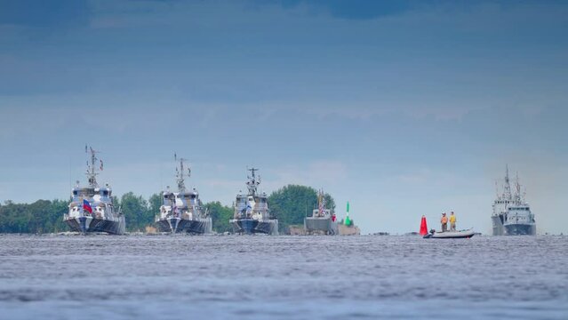 Saint-Petersburg, Russia - Jul 28 2022, 4k, passage of Russian warships along the fairway of the Gulf of Finland during the naval parade, Saint-Petersburg, Russia
