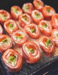 Catering table, beautifully decorated banquet with variety selection of different food snacks and appetizers on corporate birthday party event or wedding celebration, delicatessen setting