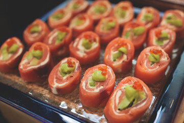Catering table, beautifully decorated banquet with variety selection of different food snacks and appetizers on corporate birthday party event or wedding celebration, delicatessen setting