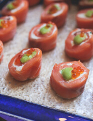 Catering table, beautifully decorated banquet with variety selection of different food snacks and appetizers on corporate birthday party event or wedding celebration, delicatessen setting
